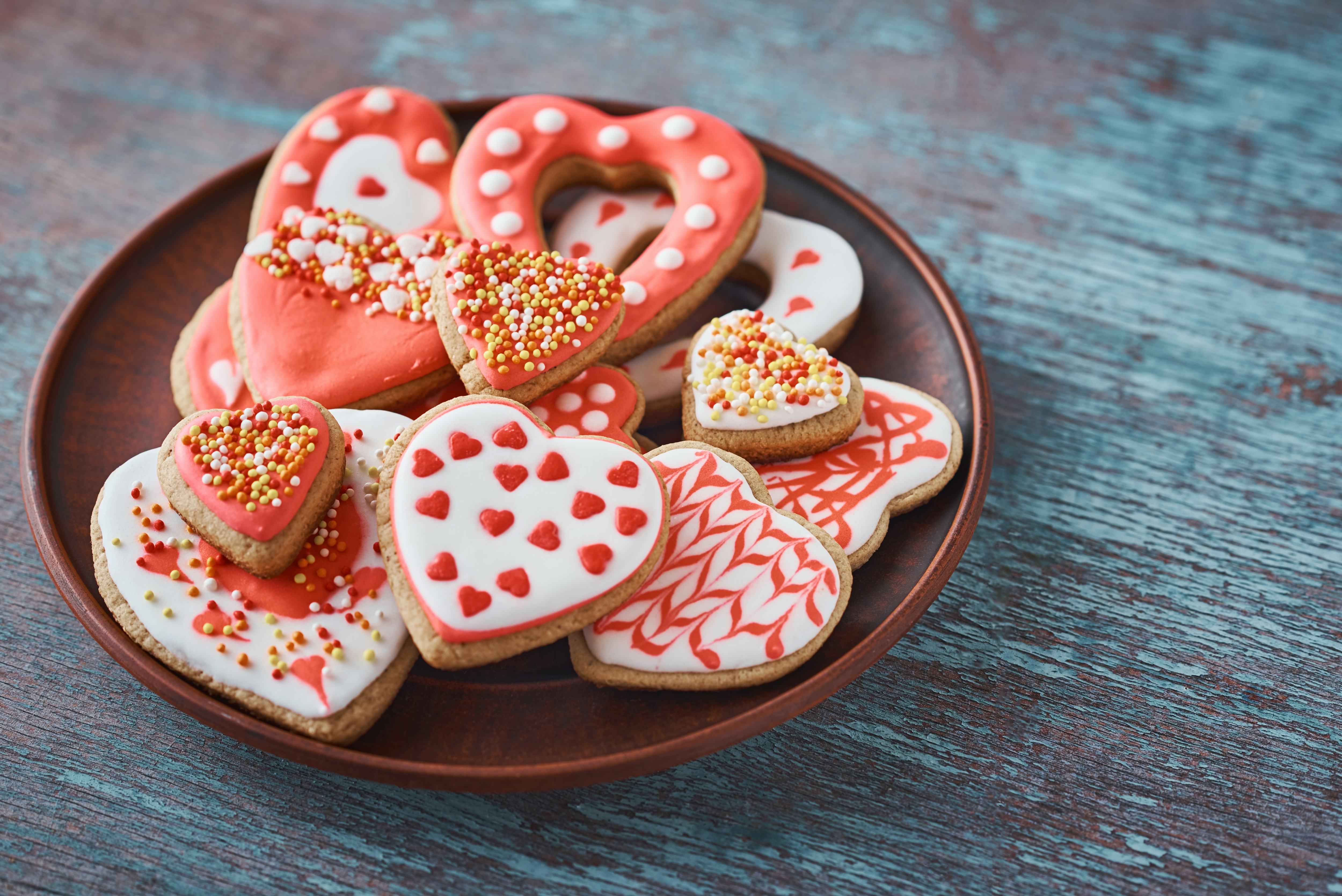 Heart-shaped Valentine's Day desserts include cookies and cakes.