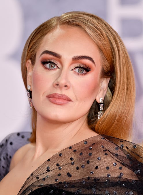 Adele wears Lorraine Schwartz diamond earrings.