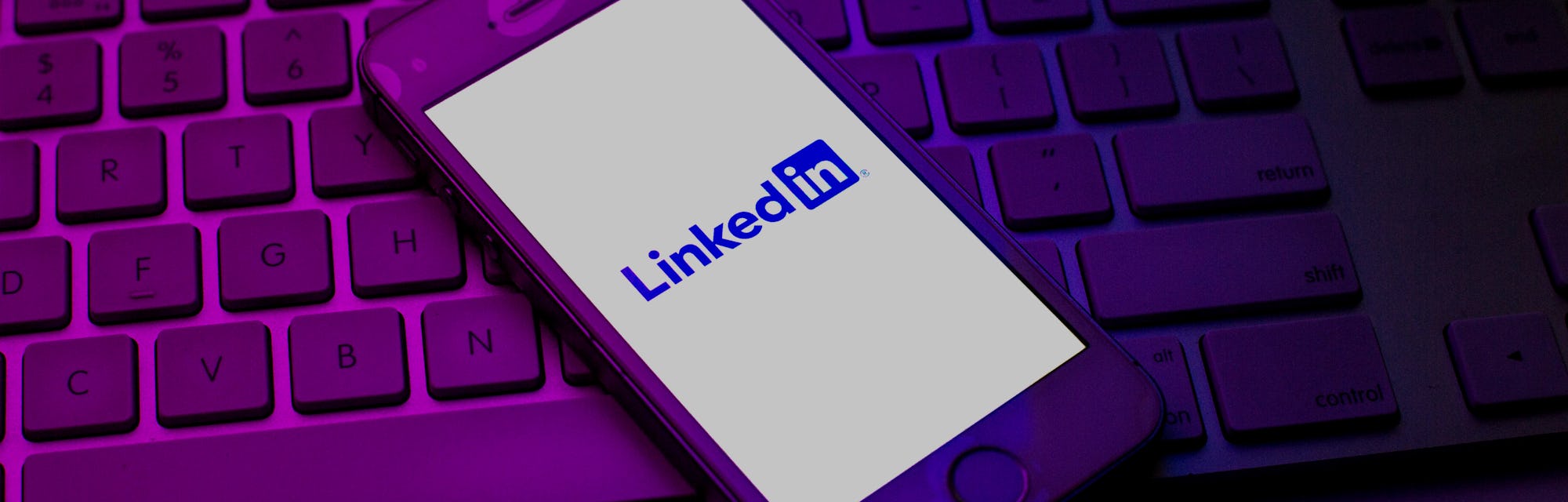 SPAIN - 2021/10/13: In this photo illustration a LinkedIn logo seen displayed on a smartphone on top...