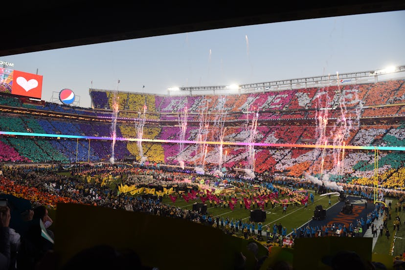 Chris Martin and Coldplay, Beyonce and Bruno Mars perform during halftime of Super Bowl 50.