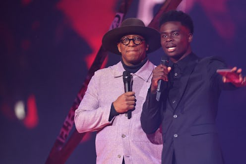  Ian Wright and Bukayo Saka present an award at The BRIT Awards 2022