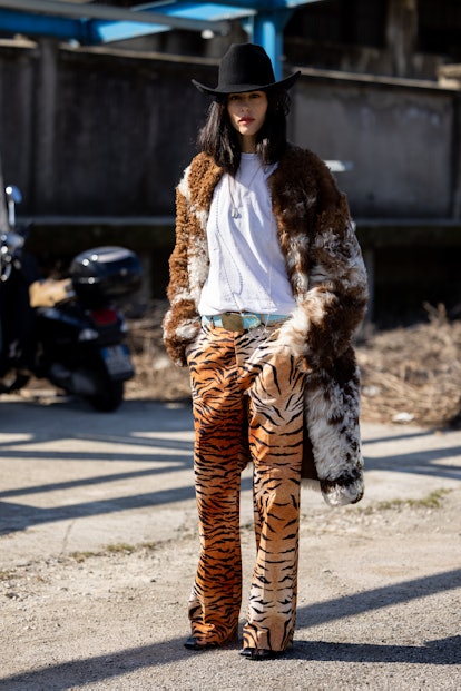 MILAN, ITALY - FEBRUARY 27: Gilda Ambrosio is seen ahead of the Dsquared2 fashion show wearing a fur...