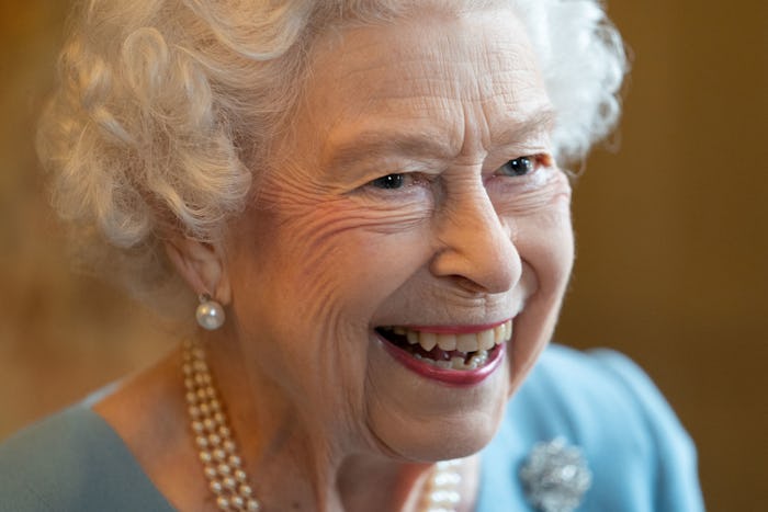 Britain's Queen Elizabeth II smiles during a reception in the Ballroom of Sandringham House, the Que...