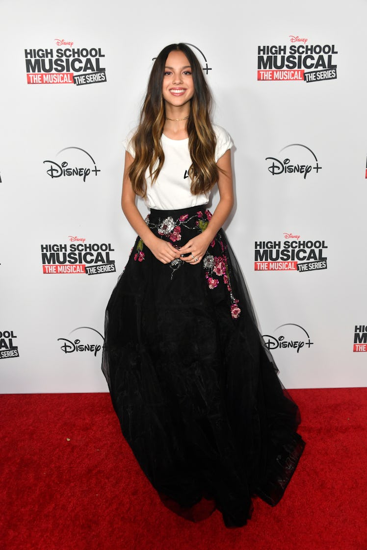 Olivia Rodrigo in a white t-shirt and tulle skirt at the Premiere Of Disney+'s "High School Musical:...