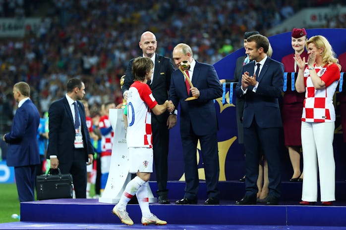 MOSCOW, RUSSIA - JULY 15:  President of Russia Vladimir Putin greets Luka Modric of Croatia as he is...