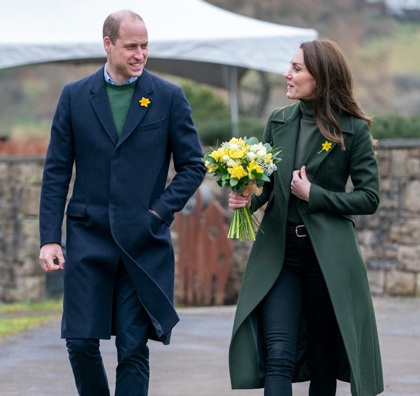Kate Middleton and Prince William wearing tailored coats. 