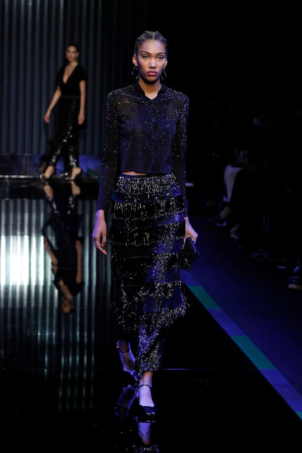 A model walks the runway at the Giorgio Armani fashion show during the Milan Fashion Week Fall/Winte...