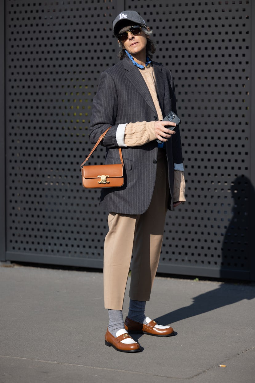 MILAN, ITALY - FEBRUARY 25: Ana Gimeno Brugada is seen ahead of the Gucci fashion show wearing a gre...