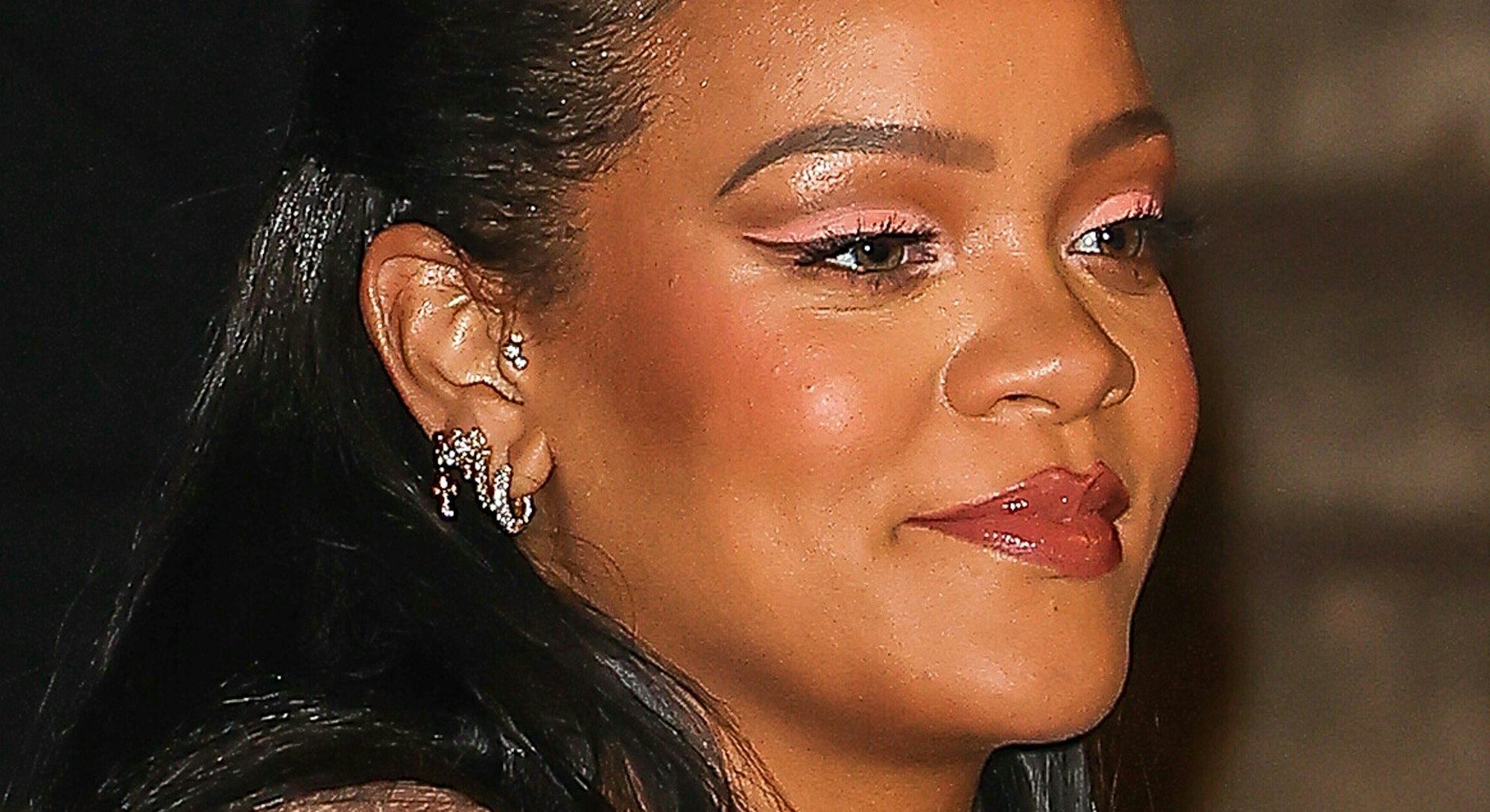 Rihanna wore peach eyeshadow at the Off-White Womenswear Fall/Winter 2022/2023 show as part of Paris...