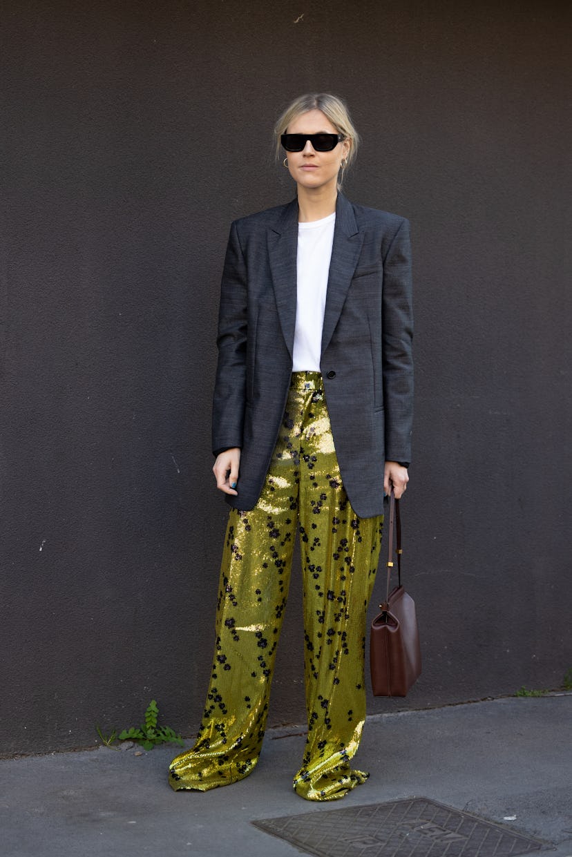 MILAN, ITALY - FEBRUARY 26: Linda Tol poses ahead of the Philosophy fashion show wearing a sequin pr...