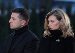 Ukrainian President Volodymyr Zelensky and his wife Olena paid tribute to the victims of the 1932-19...