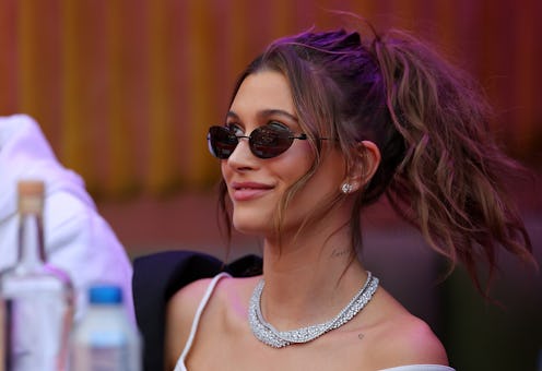 INGLEWOOD, CALIFORNIA - FEBRUARY 13: Hailey Bieber attend Super Bowl LVI between the Los Angeles Ram...