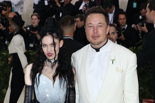 NEW YORK, NY - MAY 07:  Grimes and Elon Musk attend "Heavenly Bodies: Fashion & the Catholic Imagina...
