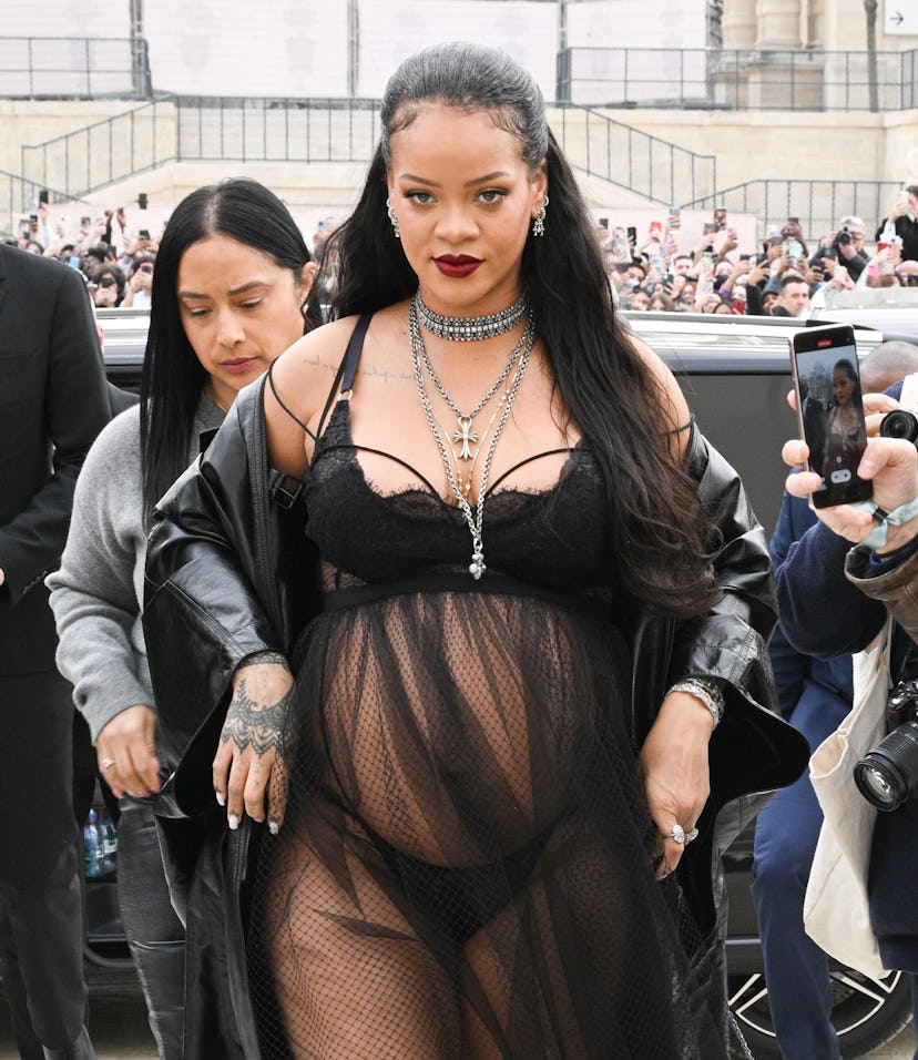 PARIS, FRANCE - MARCH 01: Rihanna attends the Dior Womenswear Fall/Winter 2022/2023 show as part of ...