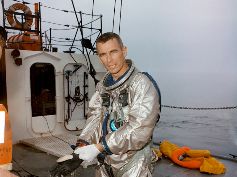 Gene Cernan stands on deck of the NASA Motor Vessel Retriever after suiting up for water egress trai...