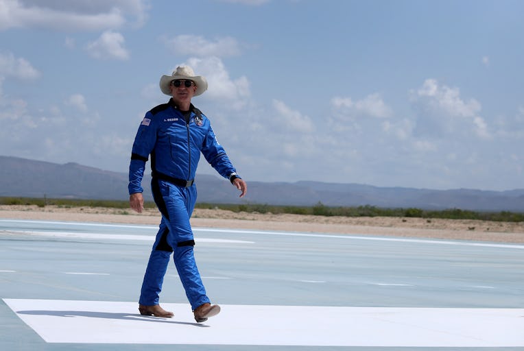 VAN HORN, TEXAS - JULY 20: Jeff Bezos walks near Blue Origin’s New Shepard after flying into space o...