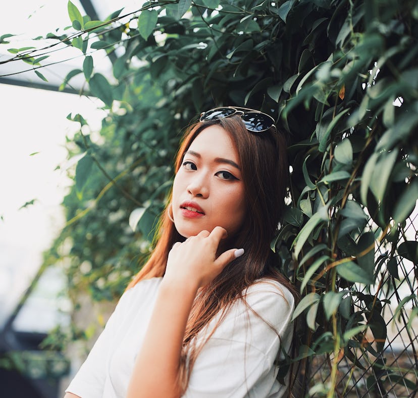 Young woman collecting her thoughts in nature, knowing the week of March 21, 2022 will be the worst ...