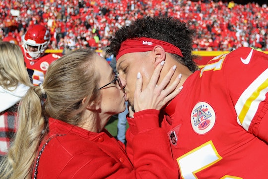 KANSAS CITY, MO - DECEMBER 12: Kansas City Chiefs quarterback Patrick Mahomes (15) kisses fiancée Br...