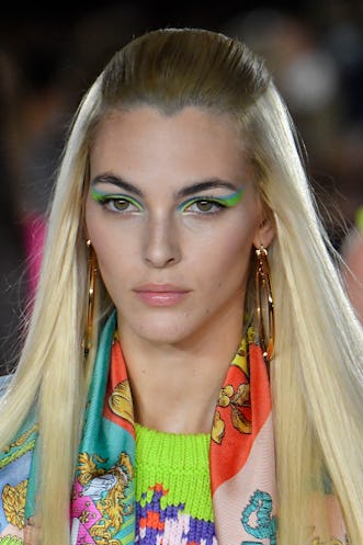MILAN, ITALY - SEPTEMBER 24: Vittoria Ceretti walks the runway during the Versace Ready to Wear Spr...