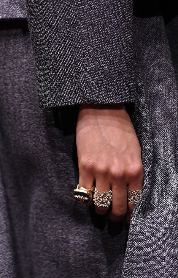 a model wearing antique-inspired rings on the Dior runway