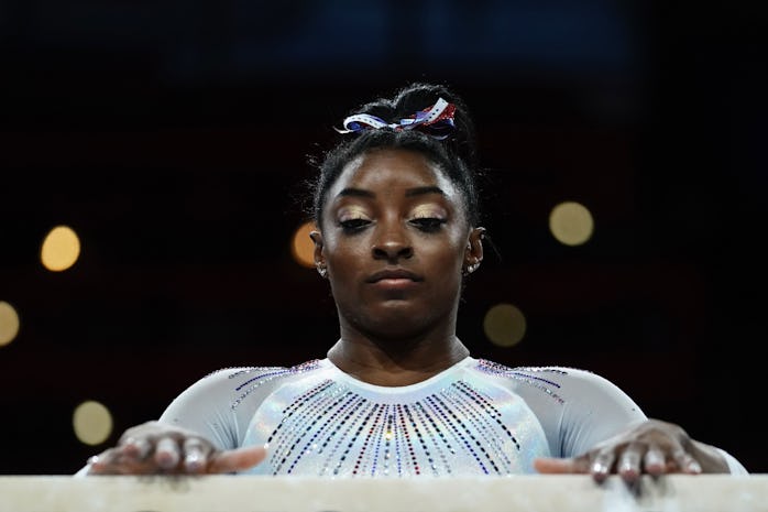 TOPSHOT - USA's Simone Biles performs on the balance beam during the women's all-around final at the...