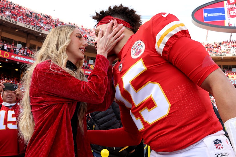 KANSAS CITY, MISSOURI - JANUARY 30: Quarterback Patrick Mahomes #15 of the Kansas City Chiefs kisses...