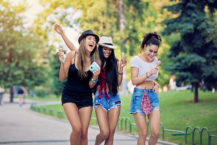 Happy friends enjoying spring break together, for which they'll need spring break captions.