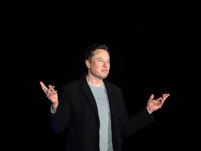 Elon Musk gestures as he speaks during a press conference at SpaceX's Starbase facility near Boca Ch...