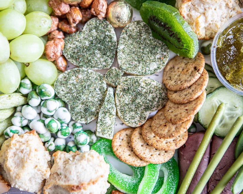 A refreshing selection of food on a charcuterie board for Sy. Patrick's Day.