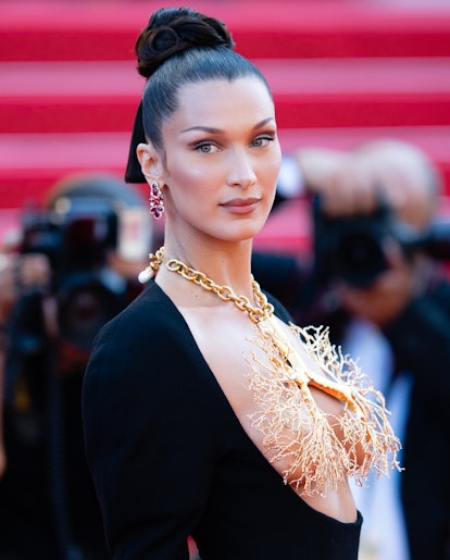 Bella Hadid opened up to 'Vogue' about being compared to her sister Gigi Hadid, working as a high-pr...