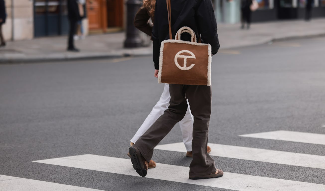 PARIS, FRANCE - MARCH 01: A guest is seen with brown telfar bag outside Nanushka presentation, durin...