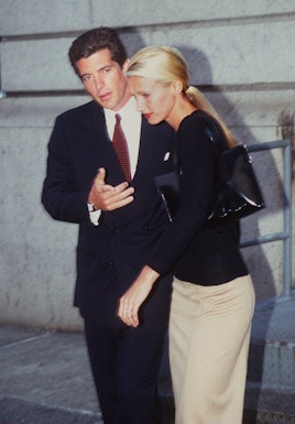 John F.  Kennedy Jr.'s new wife, Carolyn Bessette-Kennedy, wears Era Tote by Prada.