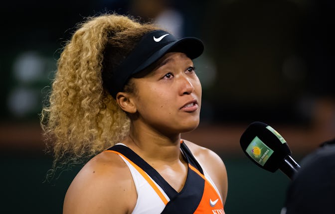 INDIAN WELLS, CALIFORNIA - MARCH 12: Naomi Osaka of Japan addresses the crowd after being heckled by...