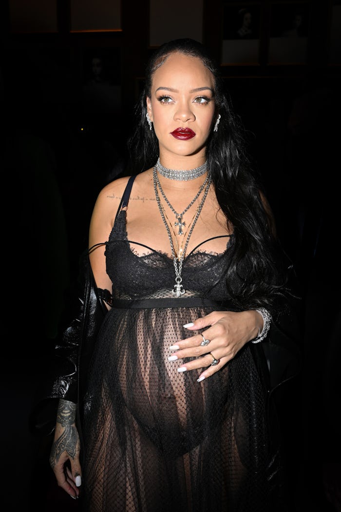 PARIS, FRANCE - MARCH 01: Rihanna attends the Dior Womenswear Fall/Winter 2022/2023 show as part of ...
