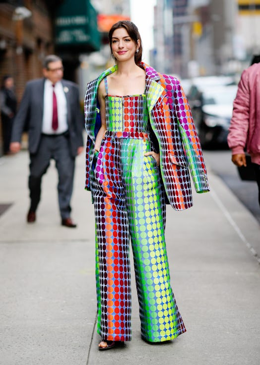 Anne Hathaway in a colorful, Christopher John Rogers look. 