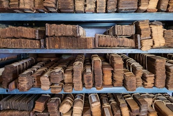 Ancient Indian palm-leaf manuscripts collected and stored at a Sanskrit library at Melkote, Karnatak...
