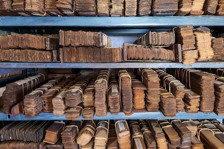 Ancient Indian palm-leaf manuscripts collected and stored at a Sanskrit library at Melkote, Karnatak...