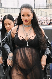 PARIS, FRANCE - MARCH 01: Rihanna attends the Dior Womenswear Fall/Winter 2022/2023 show as part of ...