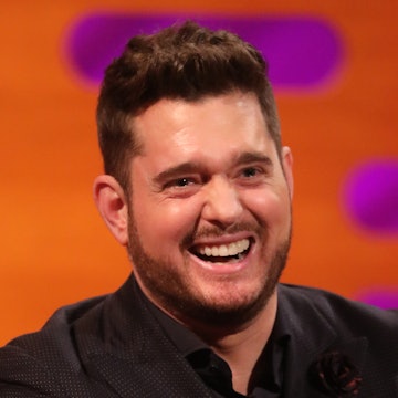 Michael Bublé laughing because he just doesn't know how to answer his son's question about why he co...