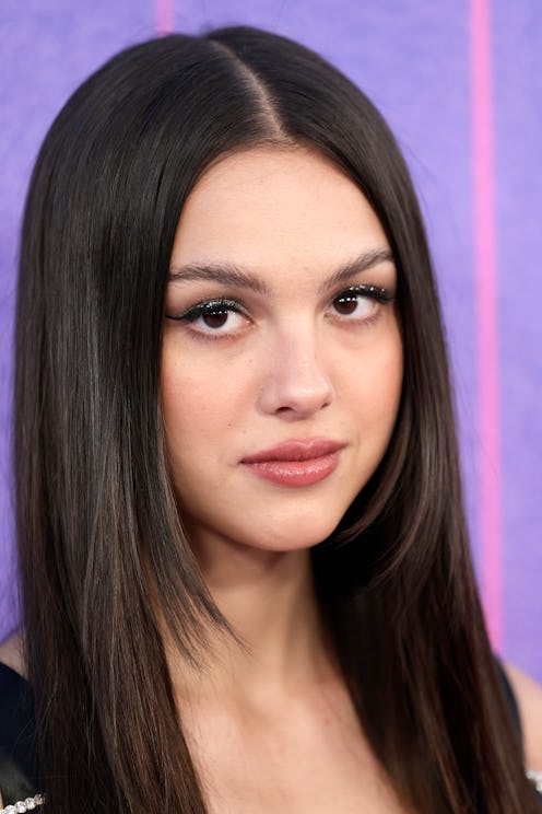 Olivia Rodrigo's green jacket was compared to the Grinch and Disney Channel stars. Photo via Getty I...