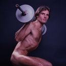 Portrait of fitness model Rick Foster as he lifts a barbell, New York, New York, October 1978. The p...
