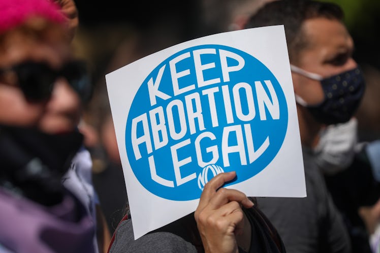 WASHINGTON, DC - OCTOBER 02: Women rights activists participate in the annual Womenâs March as they ...