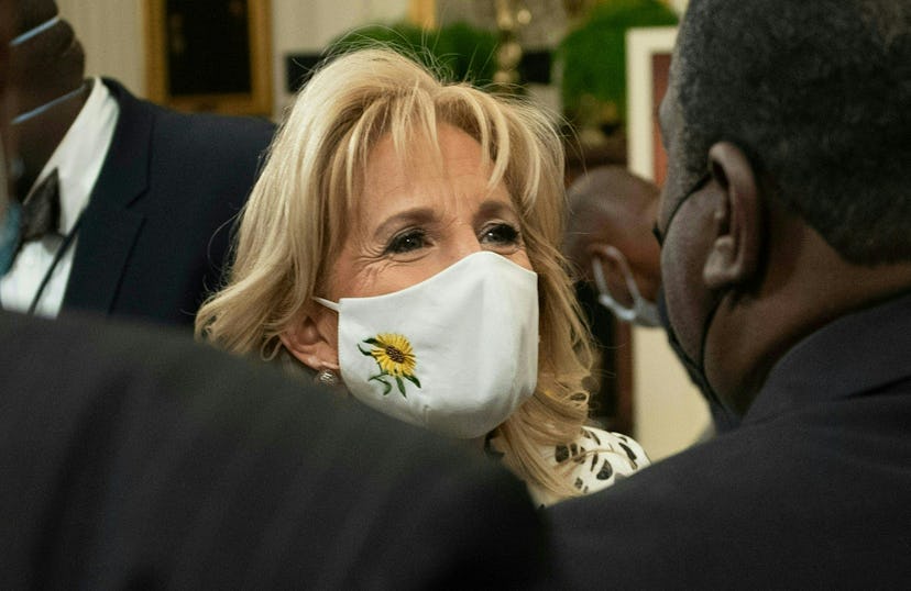 First Lady Jill Biden in a sunflower mask at the white house. 