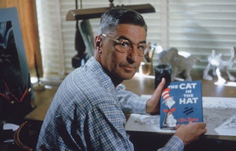 American author and illustrator Dr Seuss (Theodor Seuss Geisel, 1904 - 1991) sits at his drafting ta...