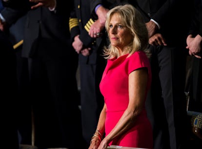 Jill Biden's Dress at the 2022 State of the Union included a small sunflower on her sleeve, a sign o...