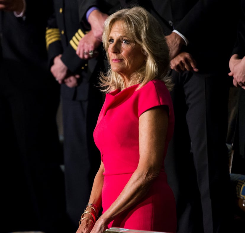 Jill Biden's Dress at the 2022 State of the Union included a small sunflower on her sleeve, a sign o...