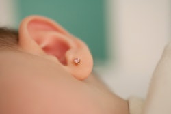 baby's pierced ear