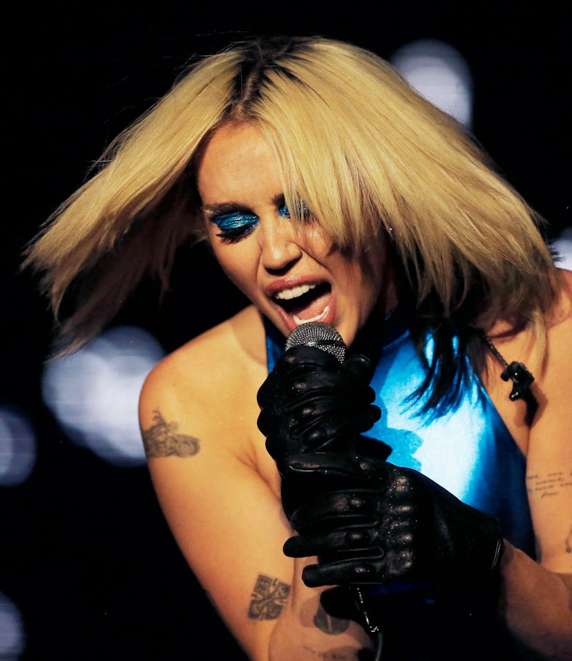 Miley Cyrus performed Hannah Montana throwbacks like "7 Things" and "Fly on the Wall" during her Sou...