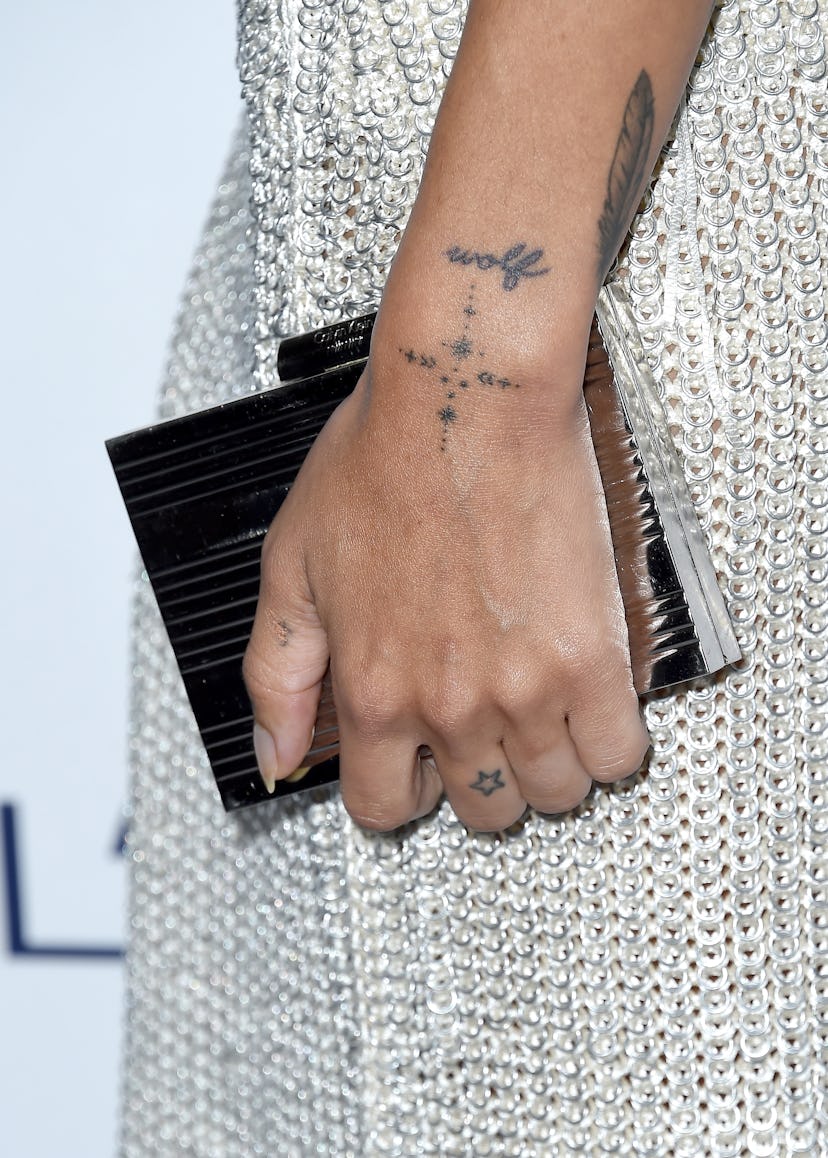 A guide to Zoë Kravitz's tattoo collection.