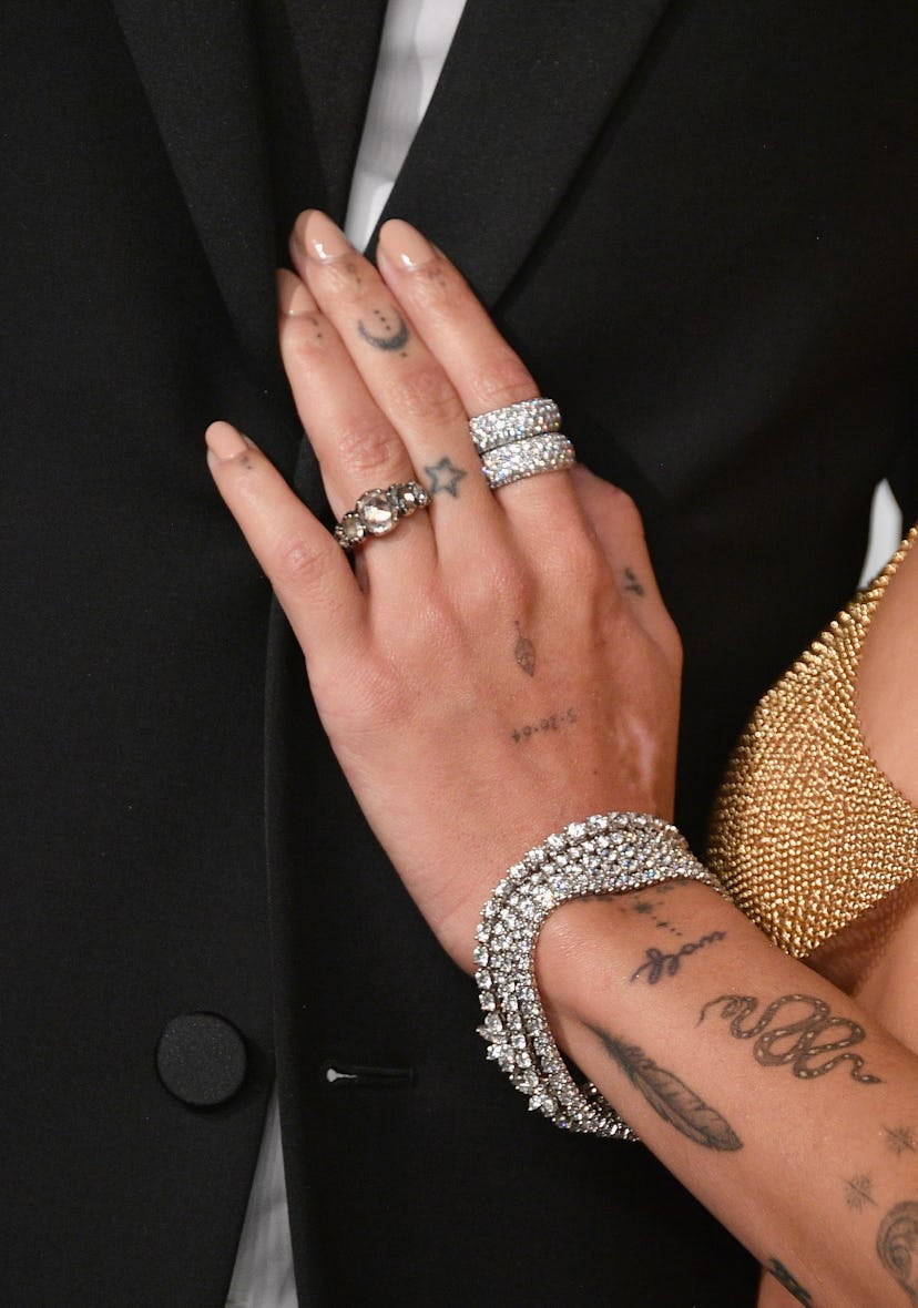 Zoe Kravitz has a feather tattoo on her left wrist.